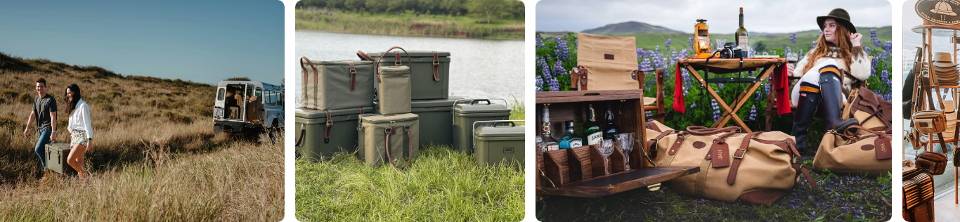 The image consists of four distinct scenes. The first scene shows a couple walking through tall grass while carrying a rugged Rogue Ice Cooler, with an off-road vehicle parked in the background. The second scene displays a collection of Rogue Ice Coolers arranged on the grass by a body of water. The third scene features a woman in outdoor attire sitting in a field surrounded by a camping setup, including a table with drinks, a wooden bar set, and canvas bags from Melvill & Moon. The fourth scene shows a display of canvas and leather bags stacked in various sizes on shelves indoors.